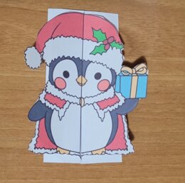 Biglietto di natale a dorma di pinguino